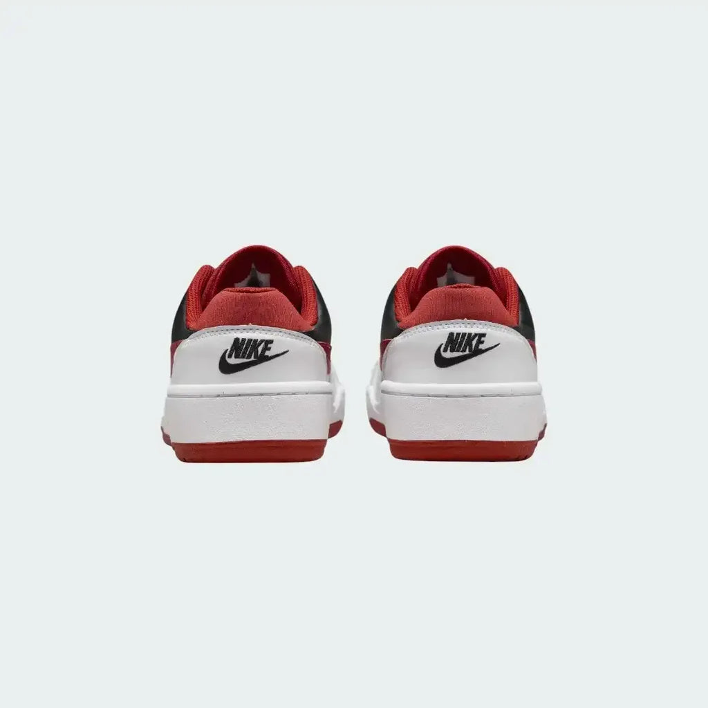 Rear view of the Nike Full Force Lo Juniors' trainers, focusing on the structured heel and Nike branding.
