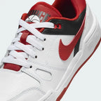 Close-up zoom on the front of the Nike Full Force Lo Juniors' trainers, showing the perforated toe box, lacing system, and layered leather texture.
