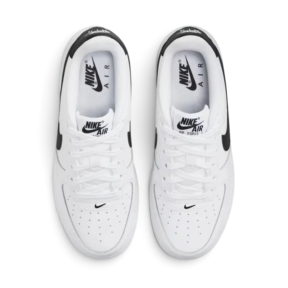 Top-down view of the trainers, highlighting the perforated toe box and the clean white lacing system.