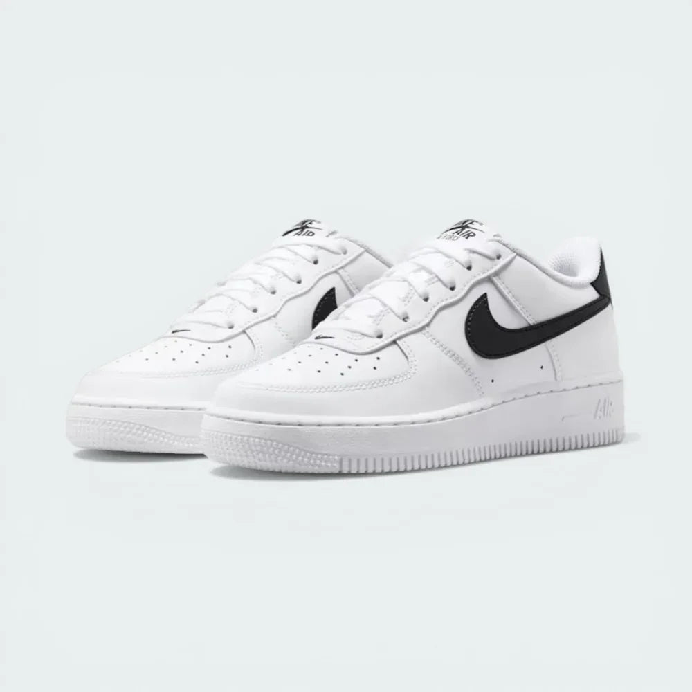 Three-quarter view of the pair, emphasizing the classic low-cut silhouette and the contrast black heel tabs.