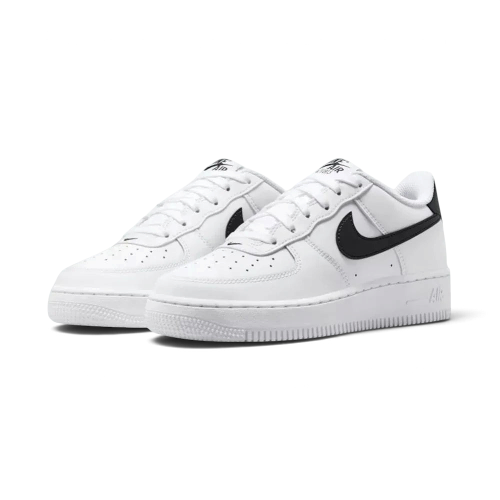 Three-quarter view of the pair, emphasizing the classic low-cut silhouette and the contrast black heel tabs.