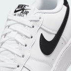 Close-up of the forefoot, focusing on the quality of the leather and the signature AF1 metal lace dubrae.