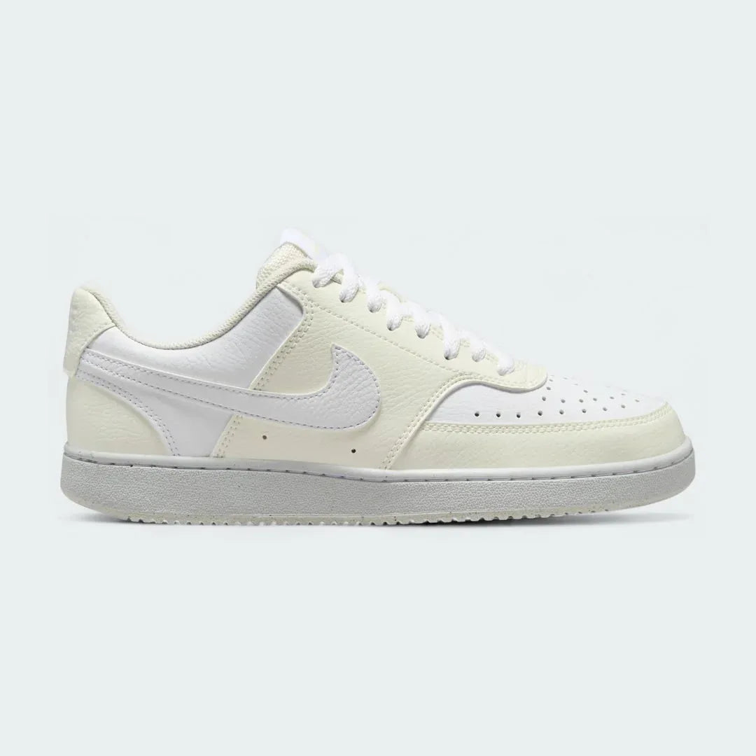 Nike Court Vision Lo Next Nature Women's trainers in white with a white Nike Swoosh, side profile showing classic basketball-inspired design and low-cut collar. Main image