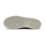 View of the outsole of the Nike Court Vision Lo Next Nature Women's white trainers, showing the durable rubber sole and pivot circle traction pattern.