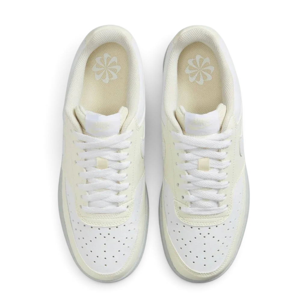 Top-Down view of a pair of Nike Court Vision Lo Next Nature Women's trainers in white, highlighting the lace-up closure and perforated toe box.
