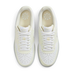 Top-Down view of a pair of Nike Court Vision Lo Next Nature Women's trainers in white, highlighting the lace-up closure and perforated toe box.