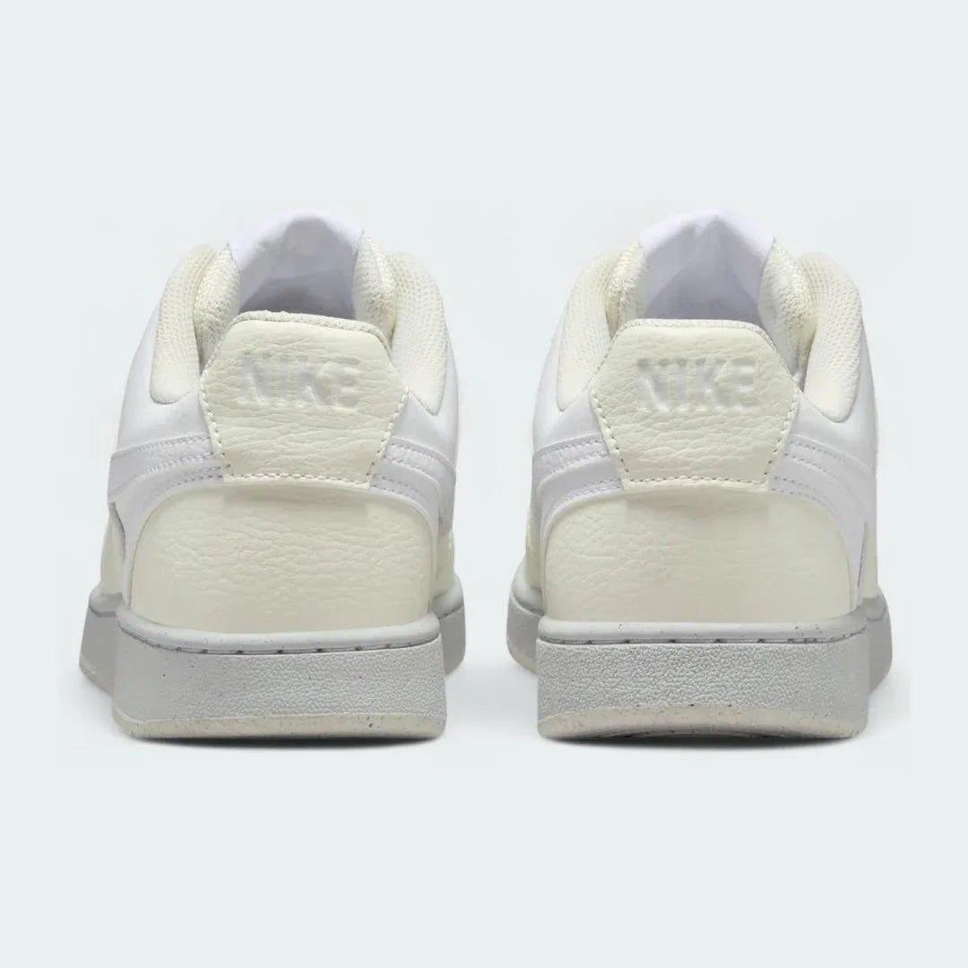 Rear view of the Nike Court Vision Lo Next Nature Women's white trainers, focusing on the heel panel and Nike branding.