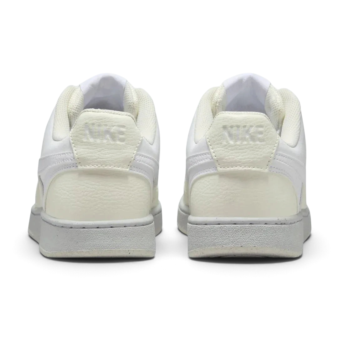 Rear view of the Nike Court Vision Lo Next Nature Women's white trainers, focusing on the heel panel and Nike branding.
