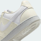 Detailed zoom on the outsole and midsole of the Nike Court Vision Lo Next Nature Women's white trainers, highlighting the classic rubber cupsole construction.