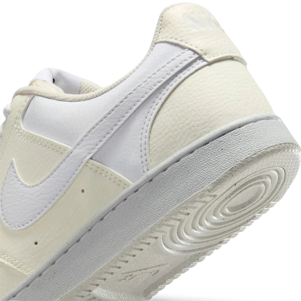 Detailed zoom on the outsole and midsole of the Nike Court Vision Lo Next Nature Women's white trainers, highlighting the classic rubber cupsole construction.