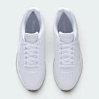 Focuses on the locked-in lacing system and the professional finish of the Reebok branding on the tongue.
