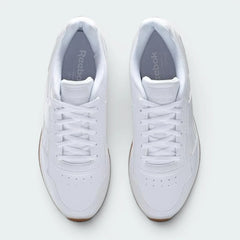 Focuses on the locked-in lacing system and the professional finish of the Reebok branding on the tongue.