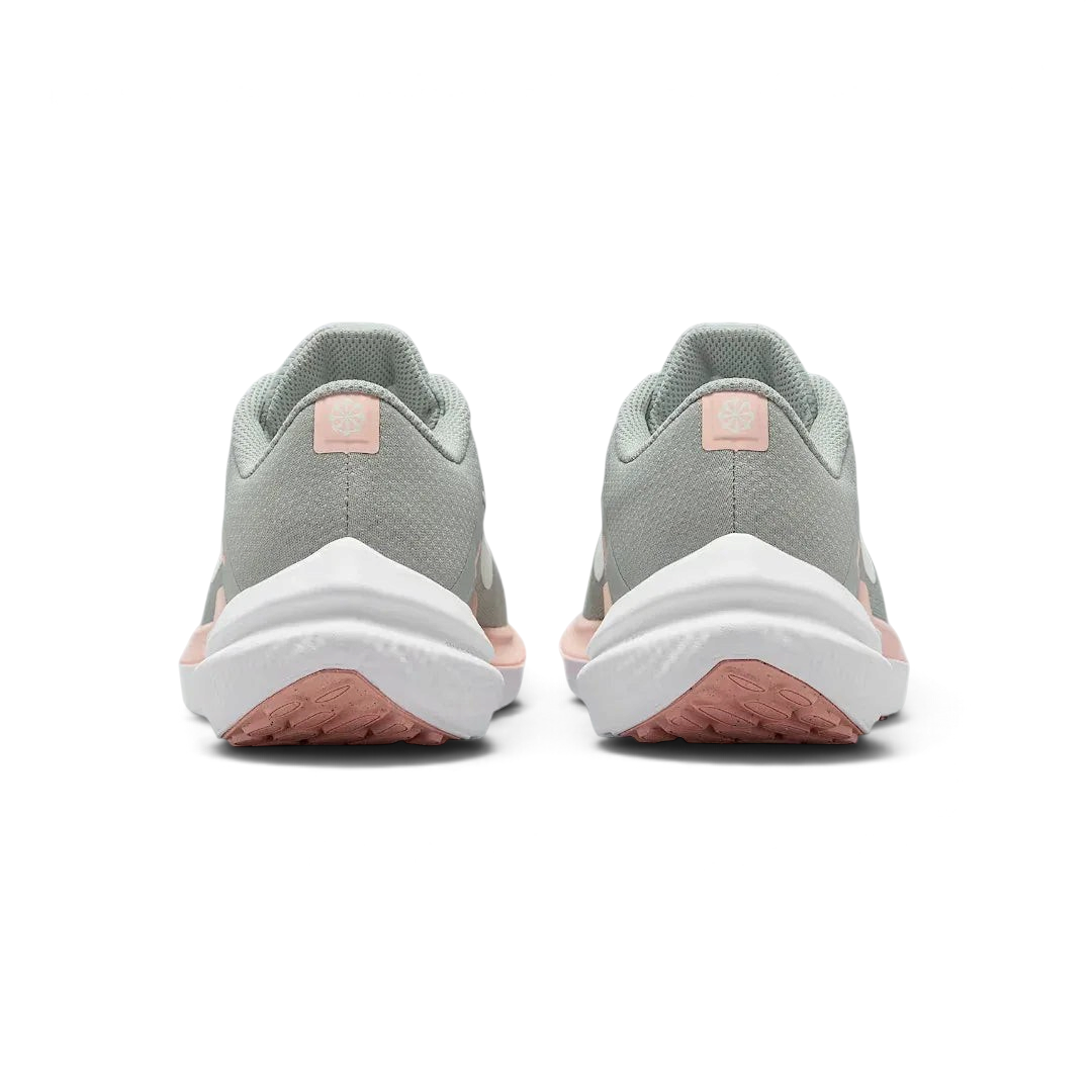 Rear view of the Nike Air Winflo 10 Women's green running shoes, focusing on the supportive heel collar and design.