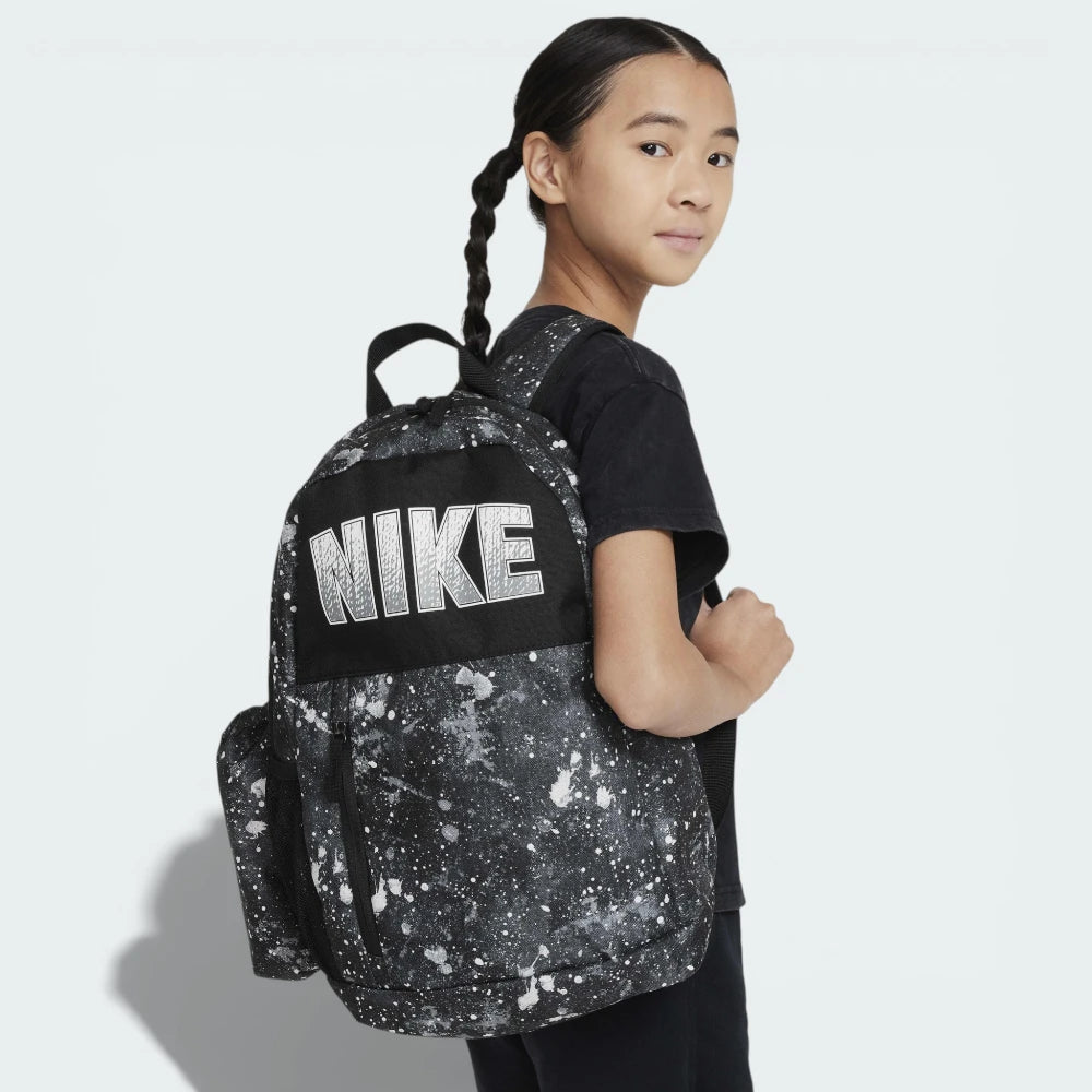 Three-quarter view of the backpack with the pencil case attached, showcasing the front zippered pocket and the iconic Nike Swoosh.