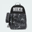 Overhead view of the backpack and the detachable pencil case laid flat, highlighting the dual-zipper entry and the Smoke Grey colorway.