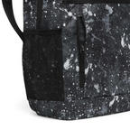 Close-up of the front zippered pocket, highlighting the durable fabric texture and the contrast Nike logo branding.