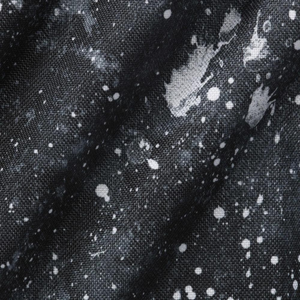 Close-up of black fabric with white speckles