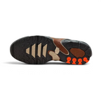 Displays the full-length black and khaki rubber outsole, showcasing the iconic Tuned Air pod layout, flex grooves, and central stability badge.