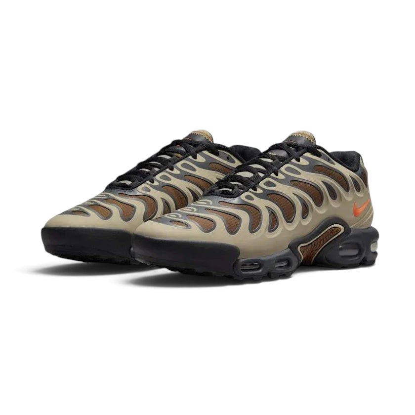 Emphasising the bold, aggressive stance of the sneakers and the vivid gradient contrast between the earthy khaki framing and fiery crimson underlays.