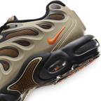 Highlights the "unreal" clean finish where the sculpted foam midsole meets the visible Air cushioning windows, whale-tail midfoot arch, and grooved rubber outsole tread.