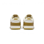 Rear view of the Nike Dunk Low Retro Men's bronze sneakers, focusing on the contrasting heel tab and Nike branding.