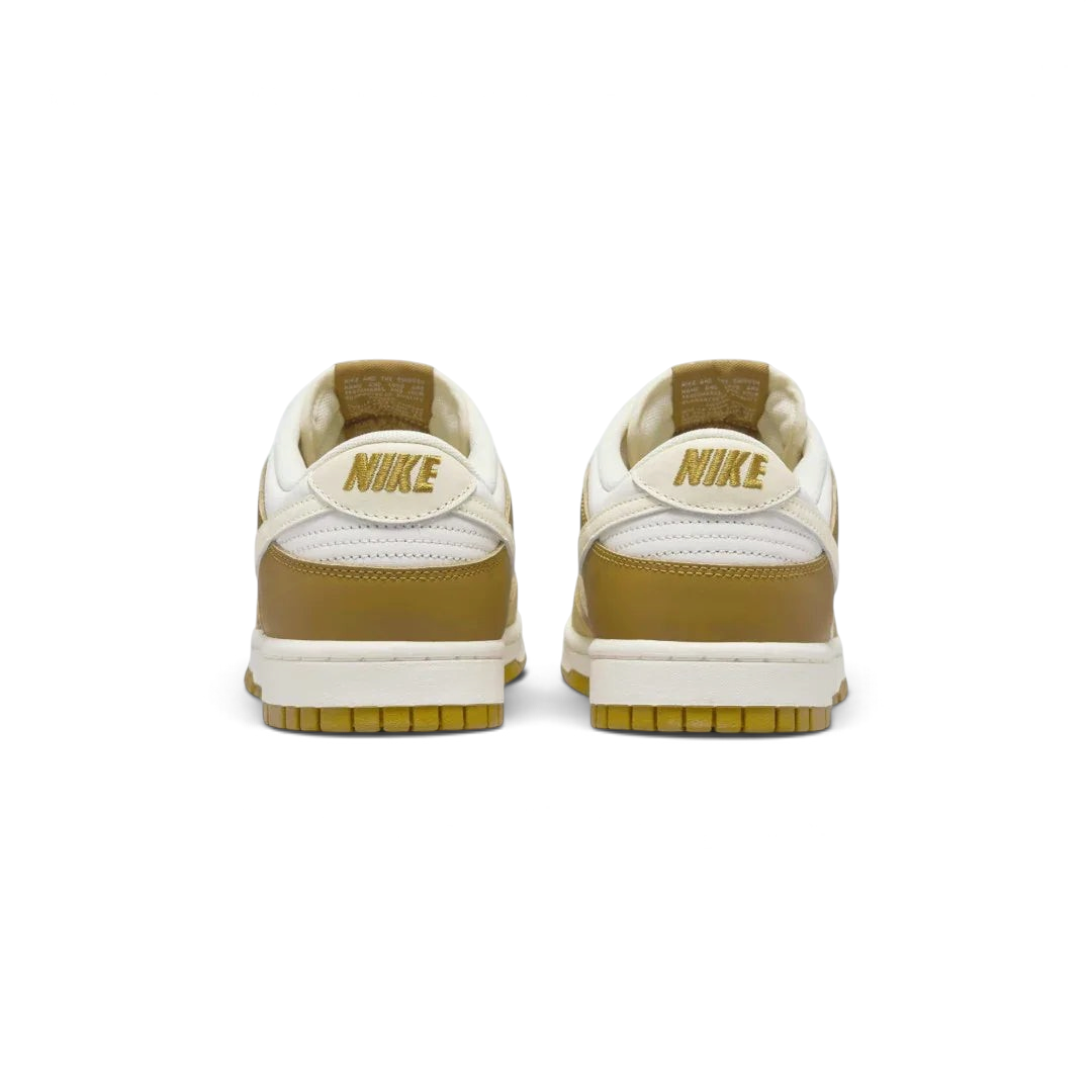 Rear view of the Nike Dunk Low Retro Men's bronze sneakers, focusing on the contrasting heel tab and Nike branding.