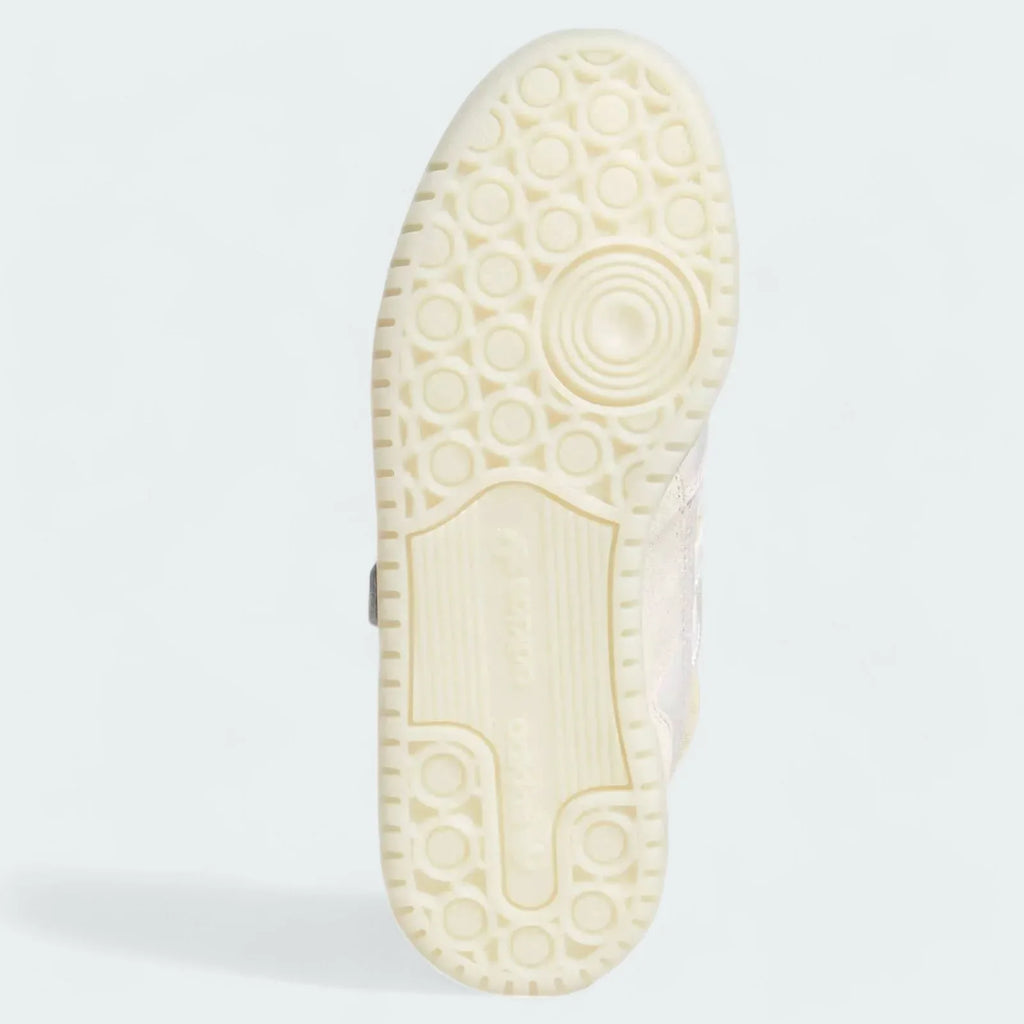View of the outsole of the Adidas x Ivy Park Forum Low women's trainers, showing the durable rubber sole and classic traction pattern.