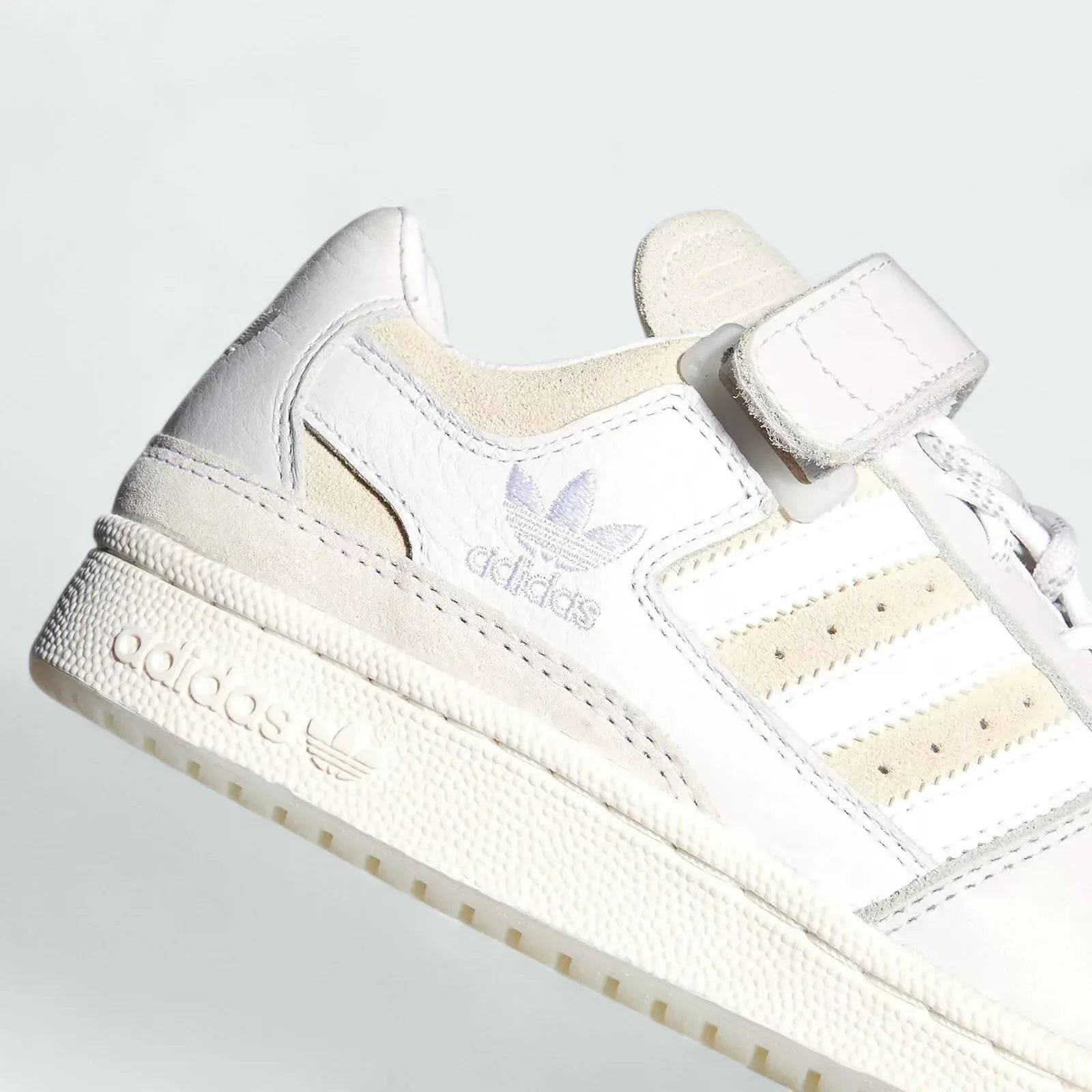 Detailed zoom on the ankle strap and midsole