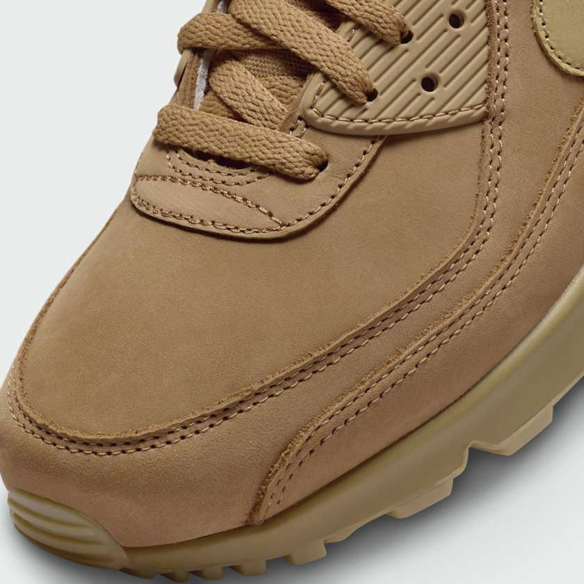 Close-up of Nike Air Max 90 Premium TRK3 Men's Trainers FZ5102-299 tongue, laces, and textured upper material