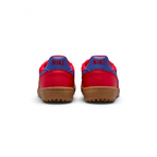 Focusing on the Deep Night navy heel tab and the seamless transition into the textured gum outsole.