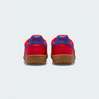 Focusing on the Deep Night navy heel tab and the seamless transition into the textured gum outsole.