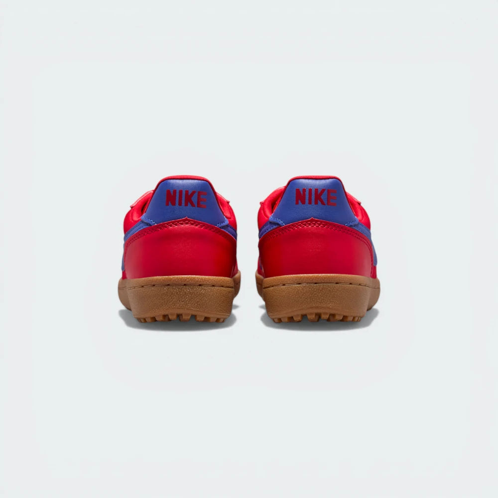 Focusing on the Deep Night navy heel tab and the seamless transition into the textured gum outsole.
