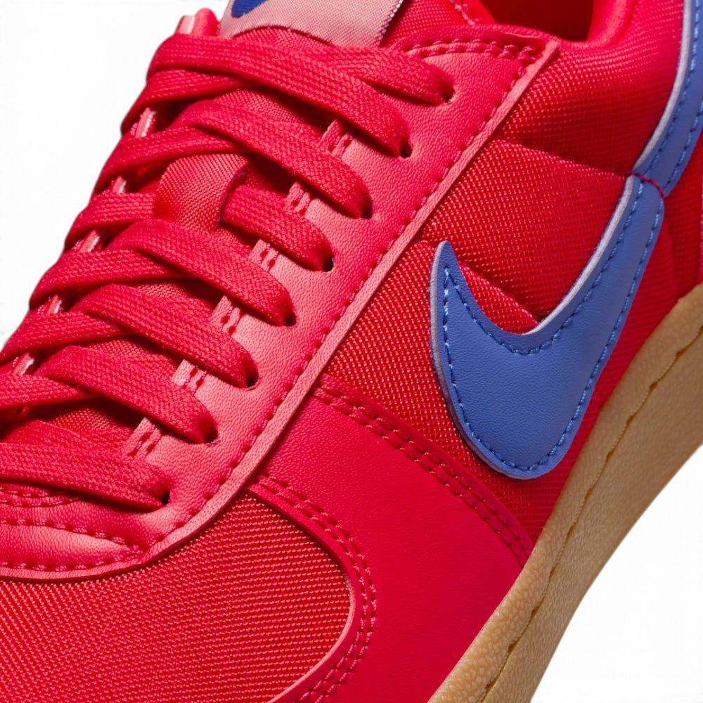 A close-up of the durable textile weave and the precision stitching on the synthetic leather overlays.