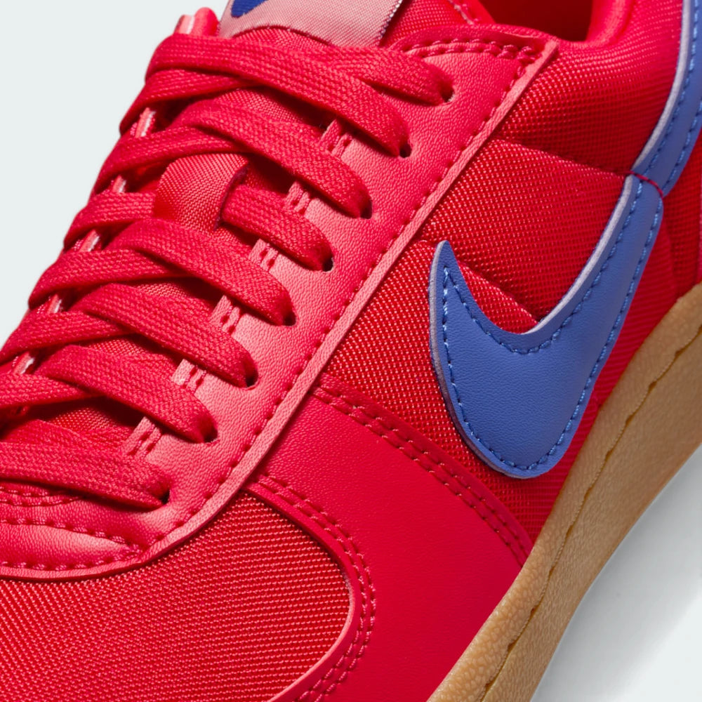 A close-up of the durable textile weave and the precision stitching on the synthetic leather overlays.