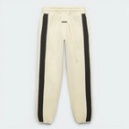 Focuses on the locked-in stretch of the gathered elasticated waist and the professional alignment of the front branding.