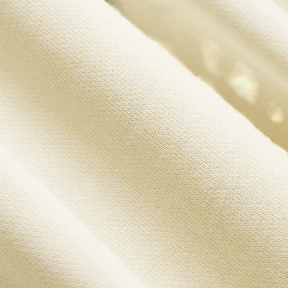 Displays the dense, incredibly soft brushed interior loop structure designed for unreal skin comfort.