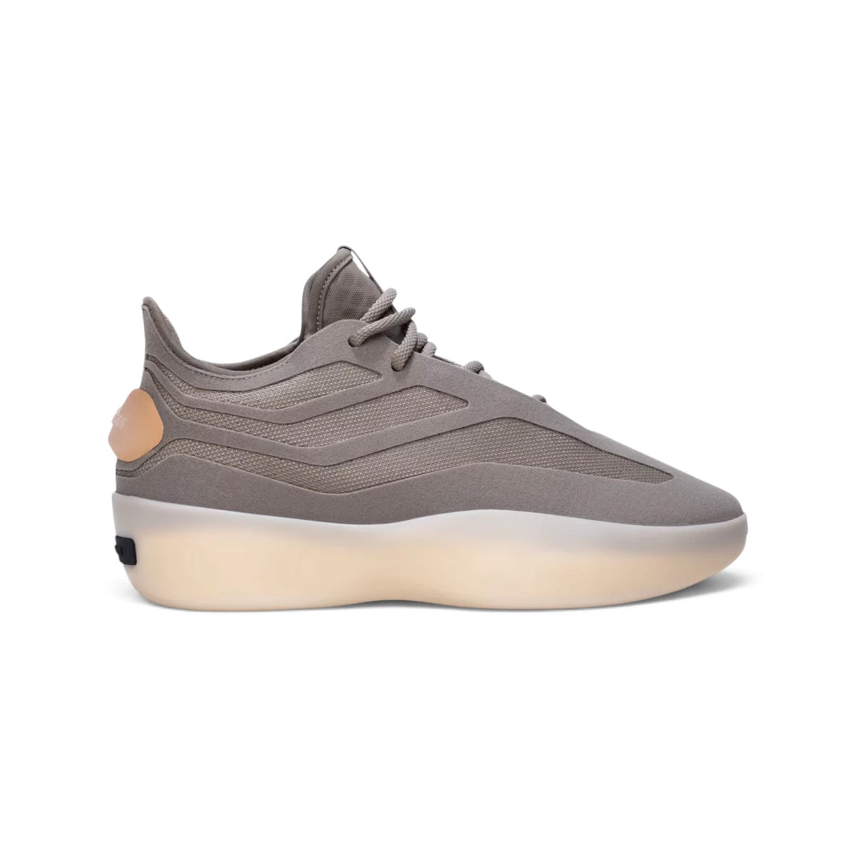Studio lateral shot of the adidas Fear of God Athletics II Basketball Shoes in Putty Beige, highlighting the low-profile synthetic upper, monofilament stripe panels, sculpted semi-translucent rubber outsole, and heel branding bar. Main image