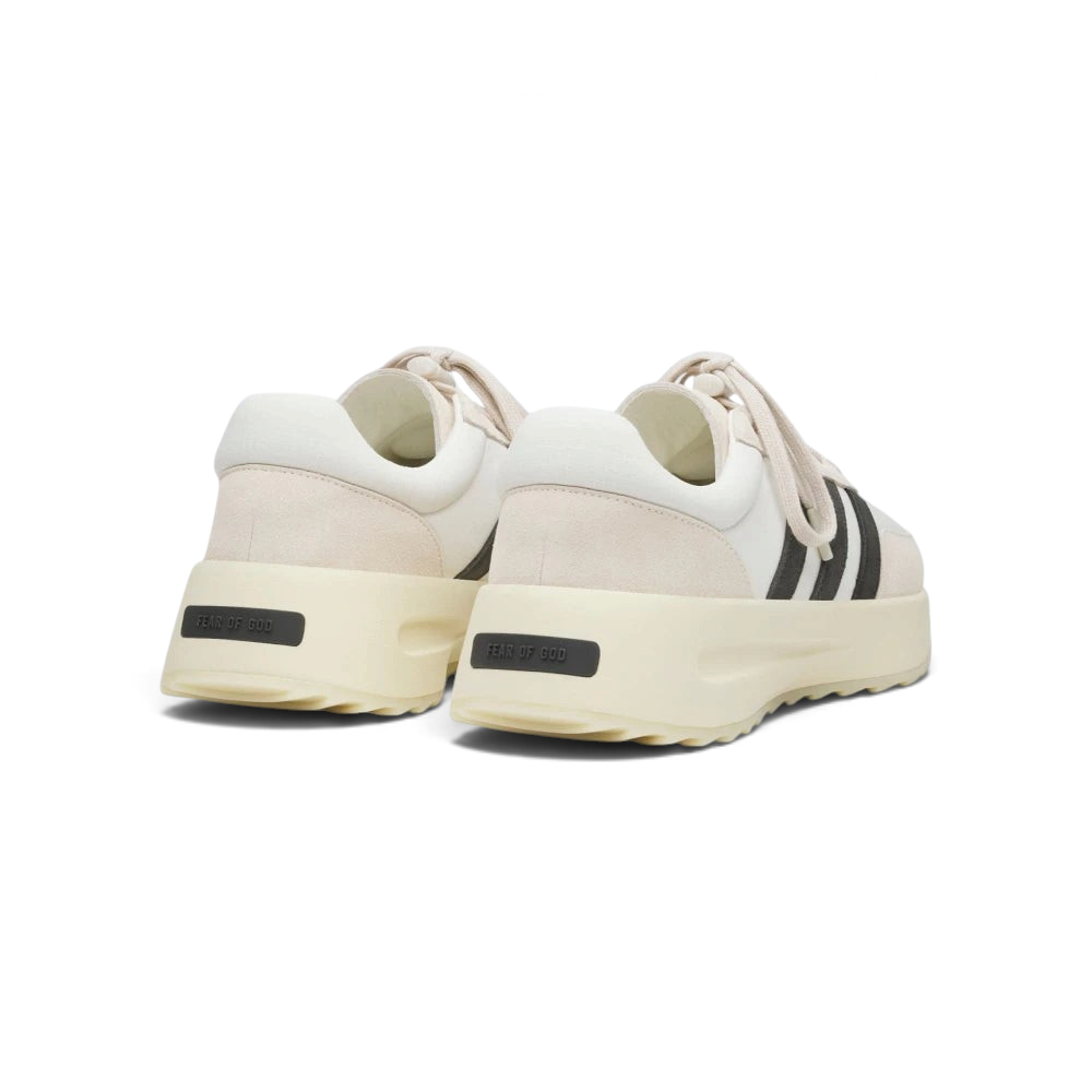 View from Behind Looking at the Heel: Focusing on the Fear of God branding on the heel bumper and the clean transition of the wavy sole.