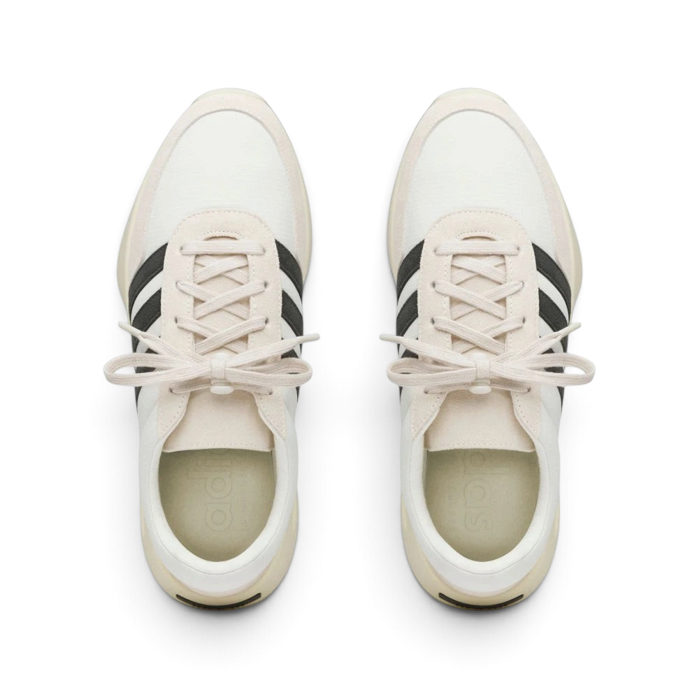 Top-Down View of Pair: Looking down at the technical lace toggle and the premium suede toe box.