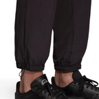Detailed zoom on the elastic waistband with drawcord or the cuffs of the Adidas Tolima 02 Men's Track Pants, highlighting the material finish.
