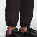 Detailed zoom on the elastic waistband with drawcord or the cuffs of the Adidas Tolima 02 Men's Track Pants, highlighting the material finish.