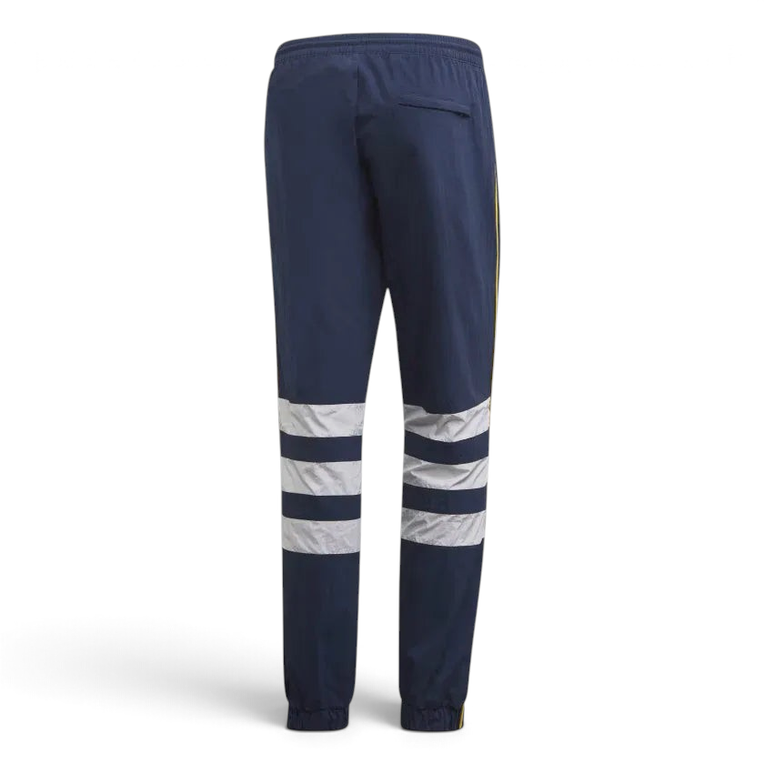 Adidas Arsenal 91-93 Track Pants Men's in collegiate navy, back view showcasing the plain design and ribbed cuffs (or zippered cuffs).