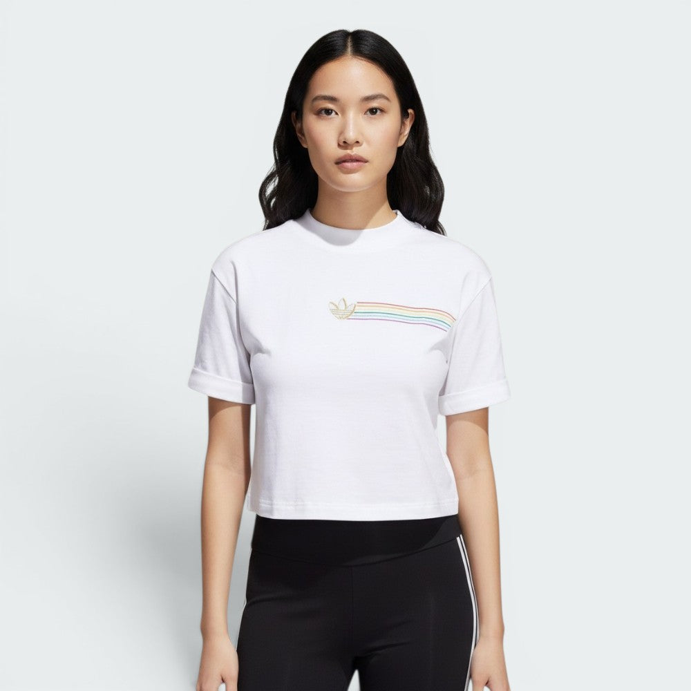 Highlights the high-velocity sweep of the shortened waistline hem, showing the professional, clean drape of the white cotton fabric and the loose, comfortable hang of the short sleeves.