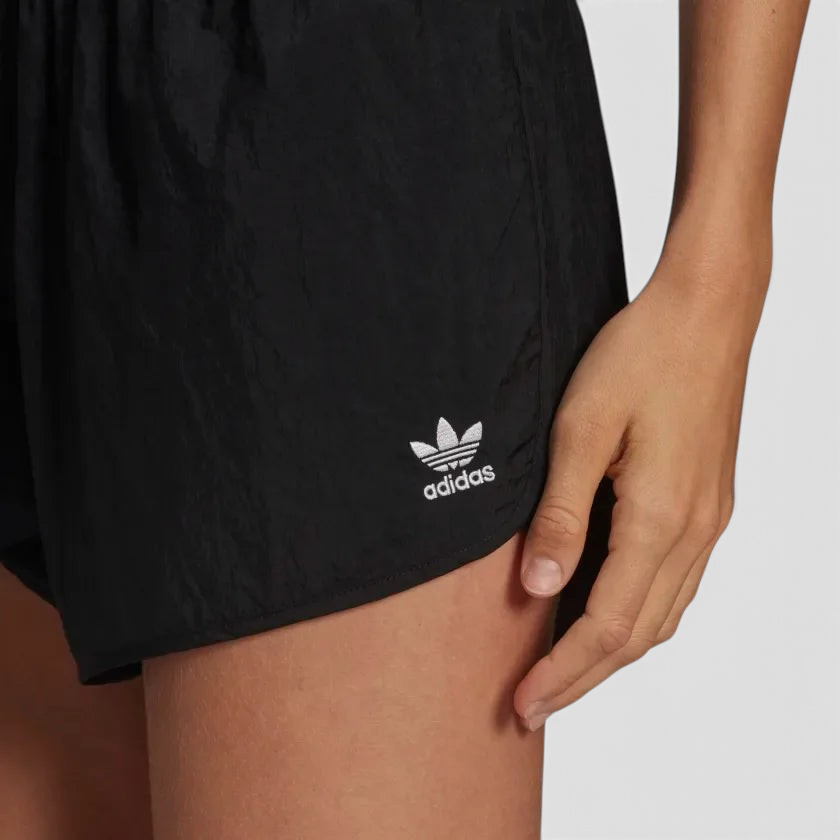 Close-up of adidas Adicolor 3-Stripes Women's Shorts GN2885 cotton fabric with Trefoil logo detail