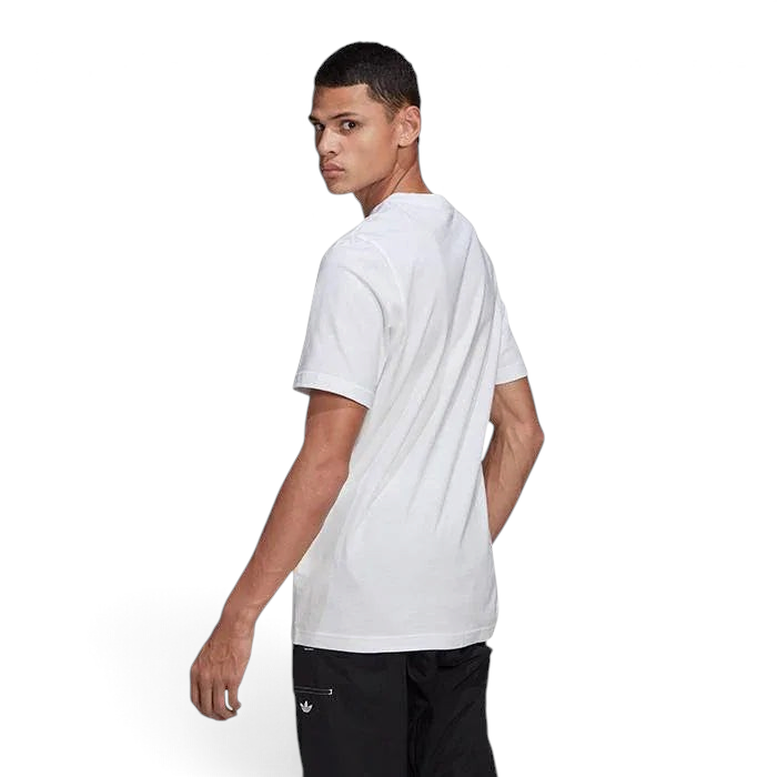 Trade Sports model wearing a white Adidas loose fit cotton t-shirt, back view showing the clean design.