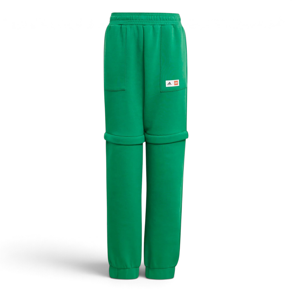 adidas x LEGO Kids' Fleece Track Pants GN6803 front view showing green fleece and LEGO-inspired design