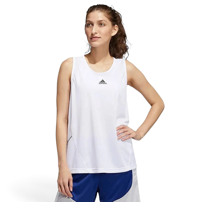 Trade Sports model wearing a white Adidas women's basketball tank top with dropped armholes and moisture-wicking fabric
