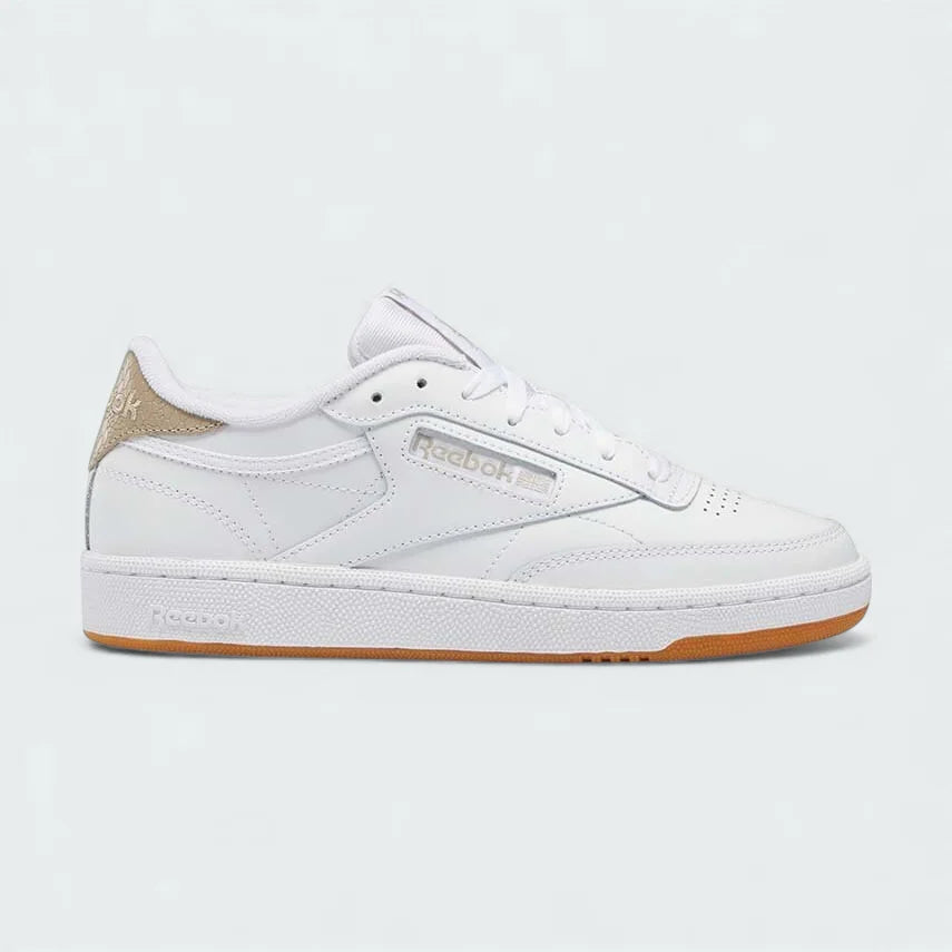 Reebok Classic Club C 85 Unisex trainers in white leather, side profile showing the iconic low-cut silhouette, cushioned midsole, and Reebok window logo.