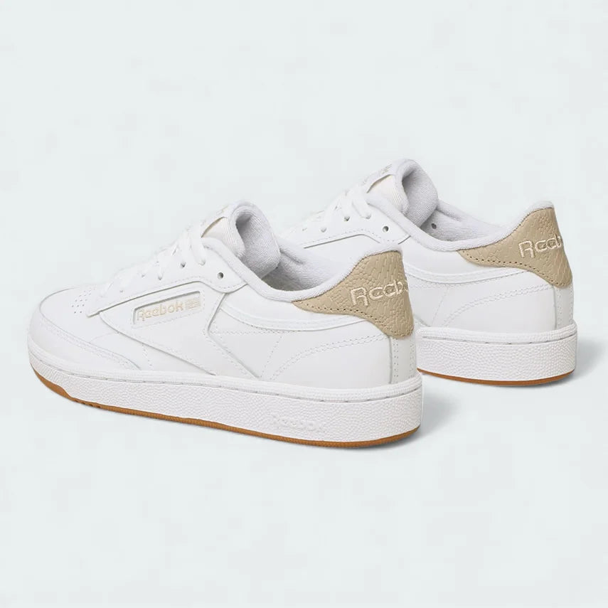 Rear view of the Reebok Classic Club C 85 Unisex white trainers, focusing on the branded heel tab.