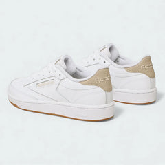 Rear view of the Reebok Classic Club C 85 Unisex white trainers, focusing on the branded heel tab.